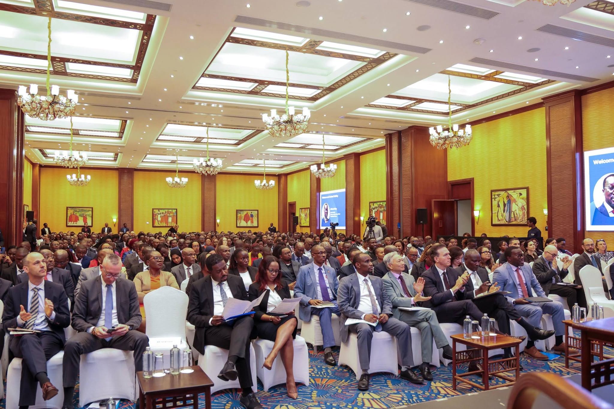 PS Ahmed and other participants follow proceedings during the High-Level Dialogue at Serena Hotel